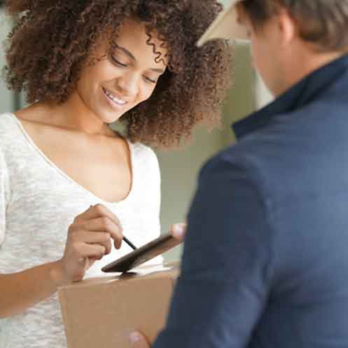 woman signing for delivery